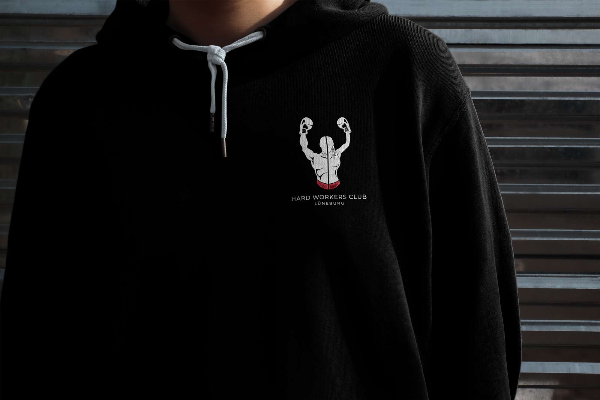 Umfassendes Branding für deine Marke: Merchandise Pullover mit Logo für den HWC Lüneburg.